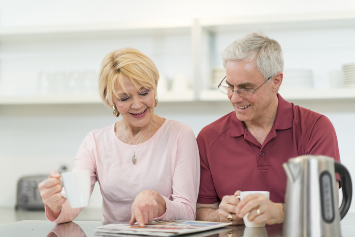 A couple evaluating their retirement benefits.